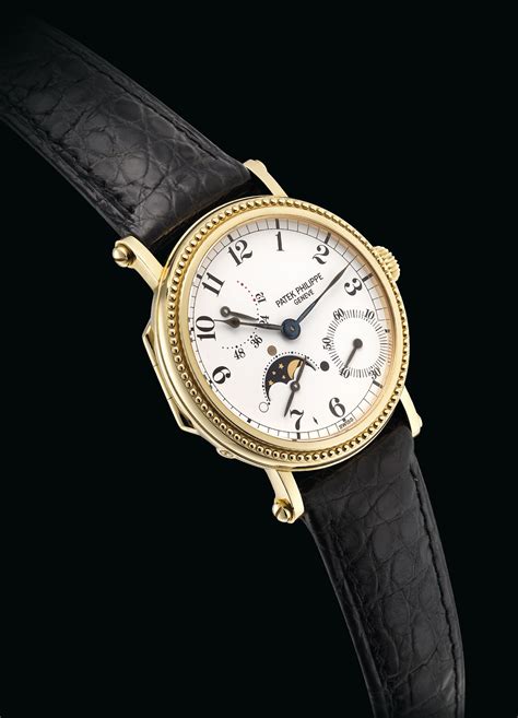 Patek Philippe. A fine 18K gold automatic wristwatch 